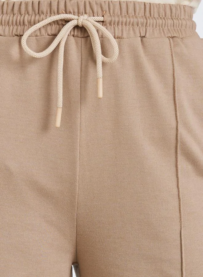 Styli Women Beige Wide Leg Joggers